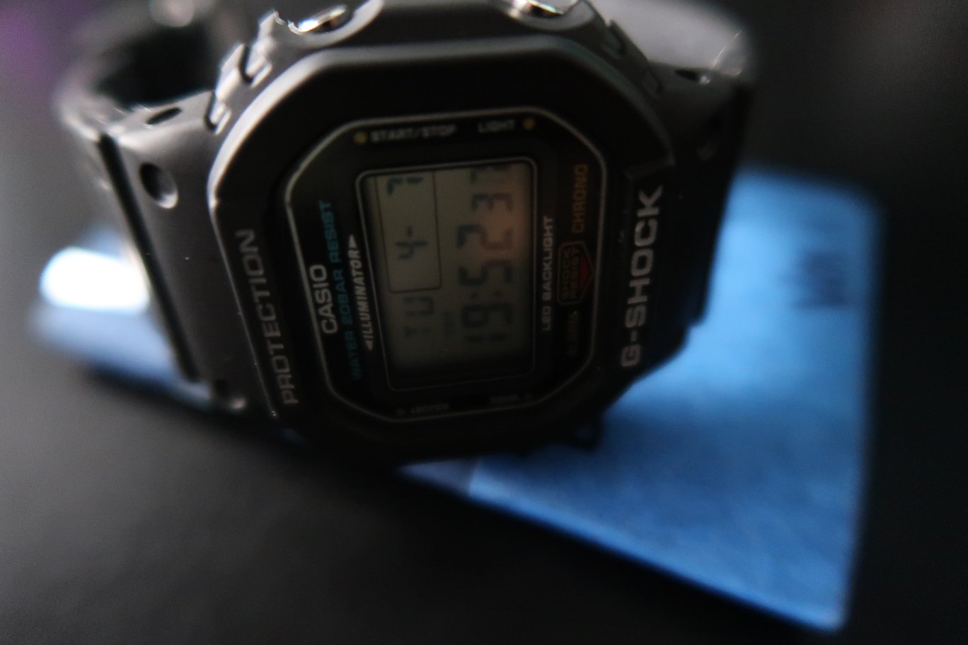 G-Shock DW-5600UE on messy desk